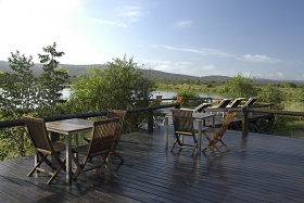 Camp Shawu deck overlooking dam