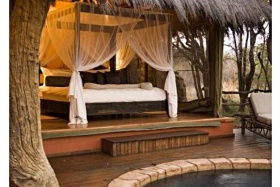Luxurious safari-style bedroom at Jaci's Safari Lodge, Madikwe Game Reserve