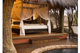 Luxurious safari-style bedroom at Jaci's Safari Lodge, Madikwe Game Reserve