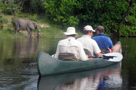 Savuti camp game viewing by canoe